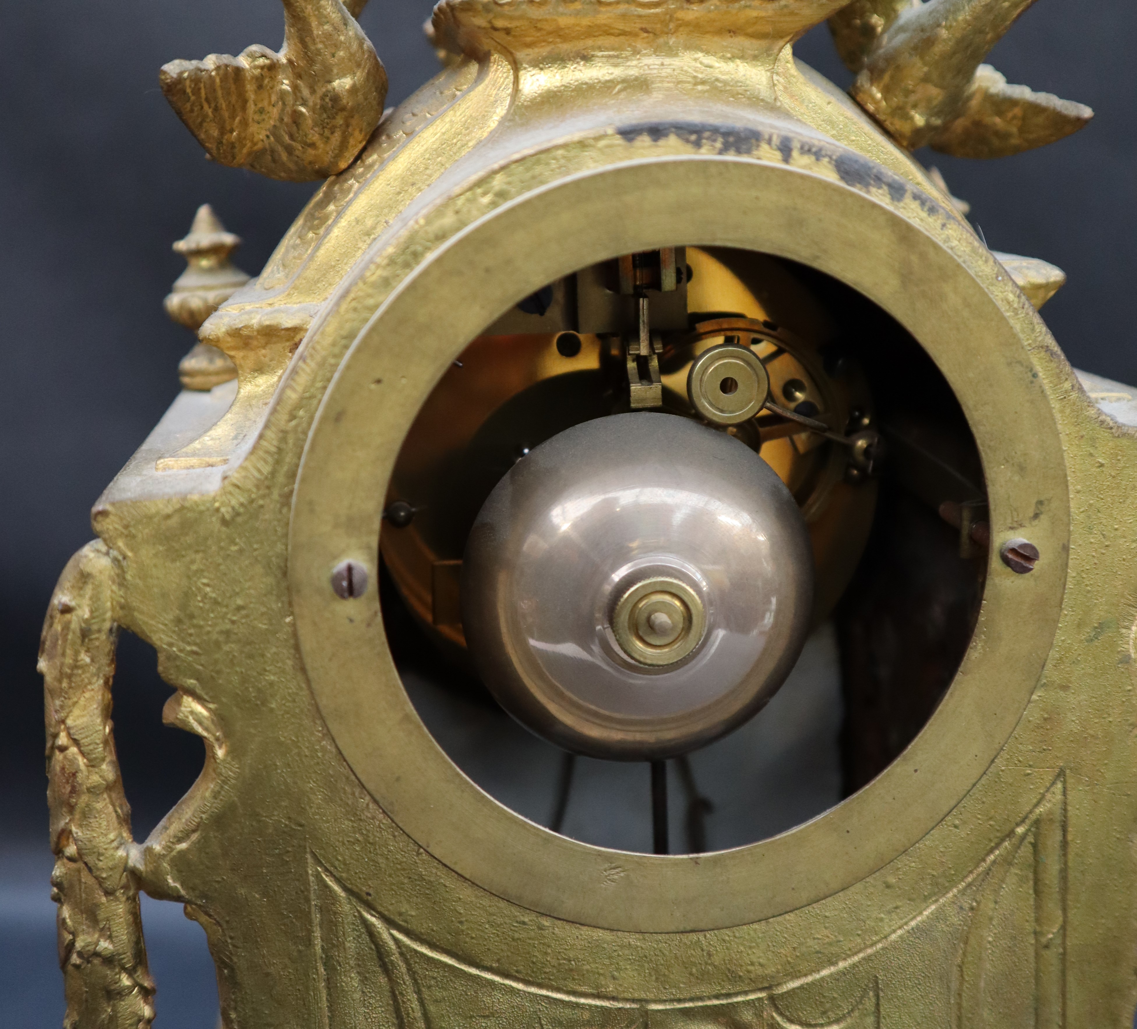 A 19th century French ormolu clock with a porcelain urn surmount, - Image 3 of 5