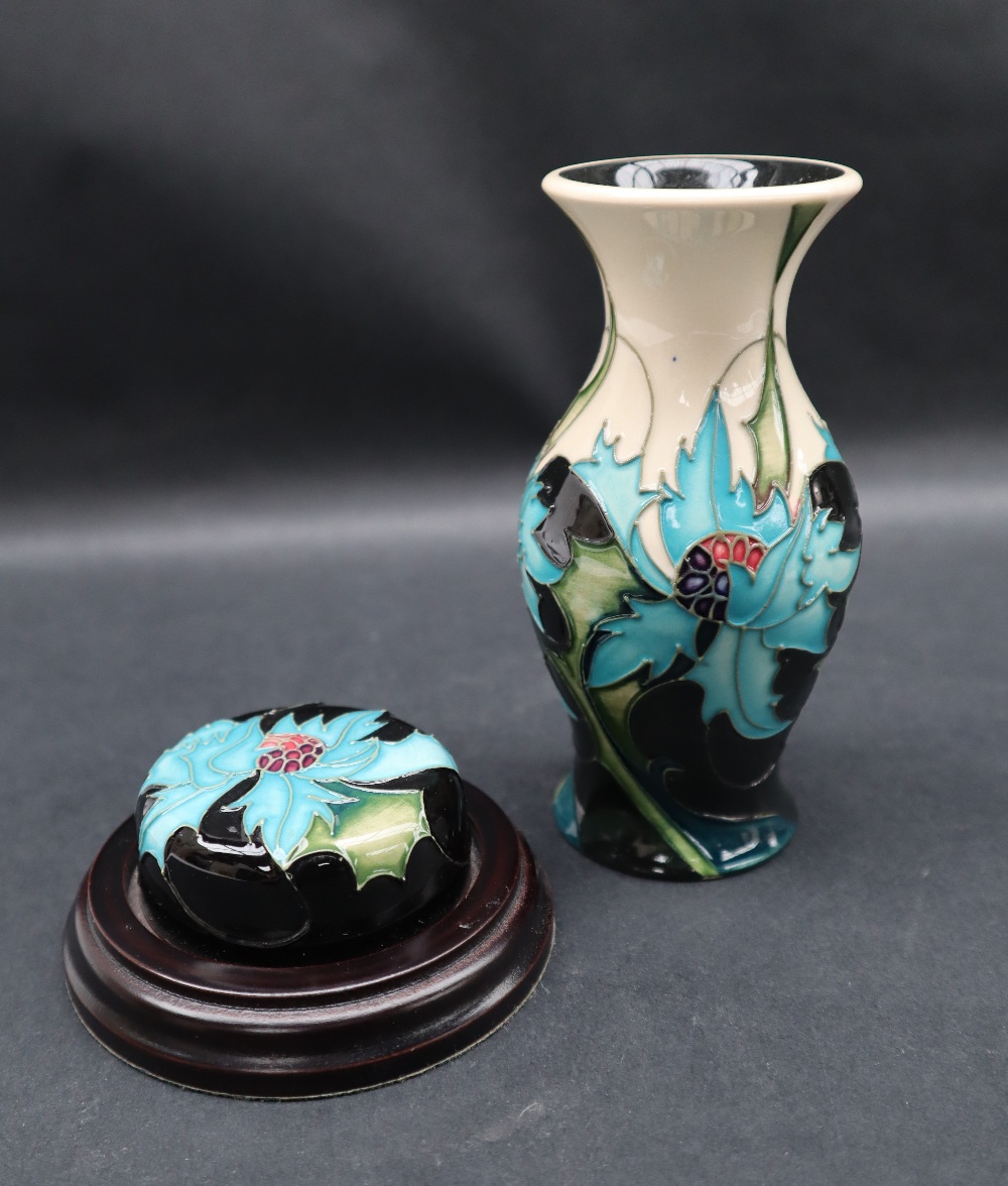 A moorcroft pottery vase decorated in the Sea Holly pattern, by Emma Bossons, impressed marks,