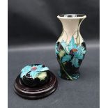 A moorcroft pottery vase decorated in the Sea Holly pattern, by Emma Bossons, impressed marks,