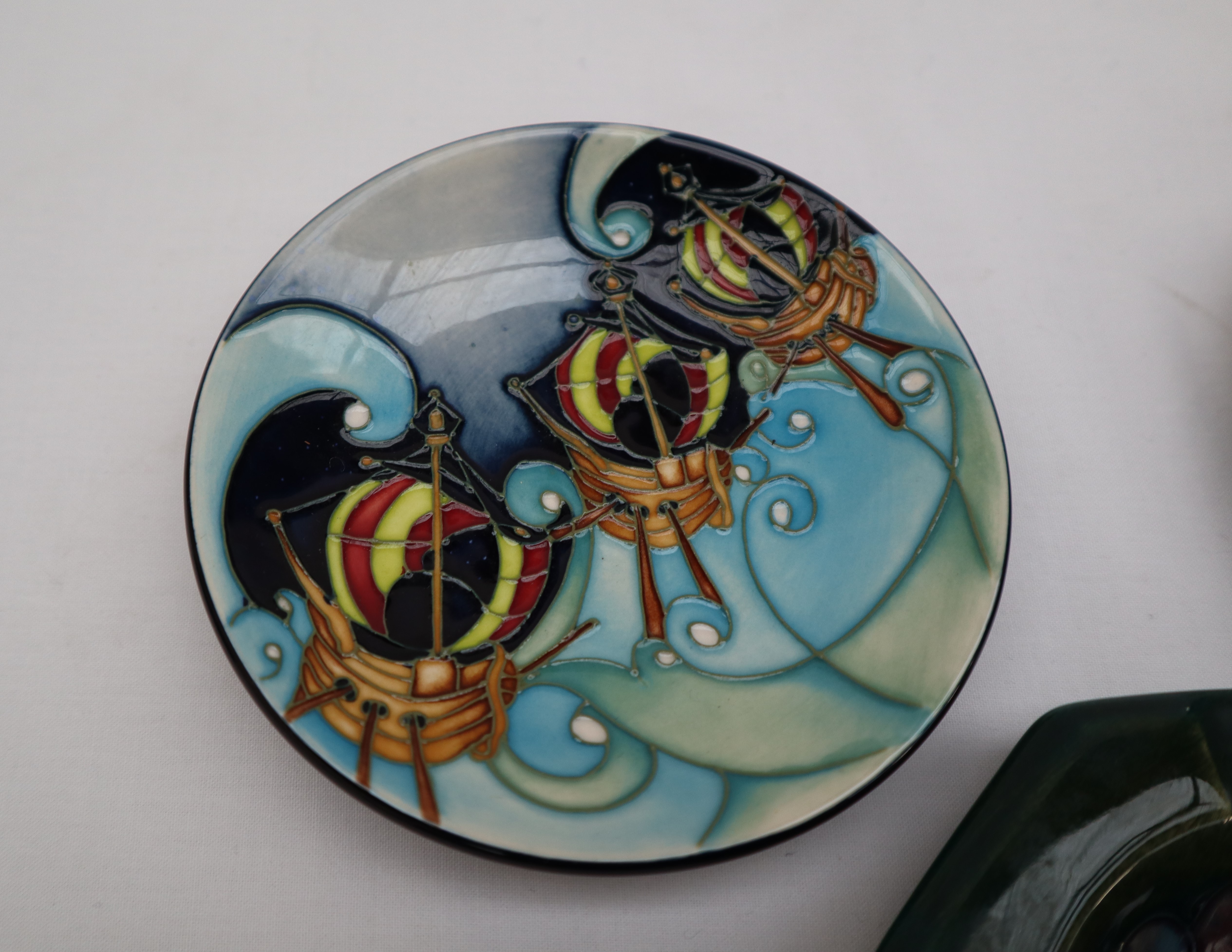 A Moorcroft pottery pin tray of circular form decorated with three ships, impressed marks, - Image 3 of 4