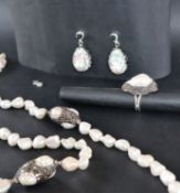 A pearl and paste set necklace, earrings, and ring set,