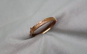 A 9ct yellow gold child's bangle, approximately 2.