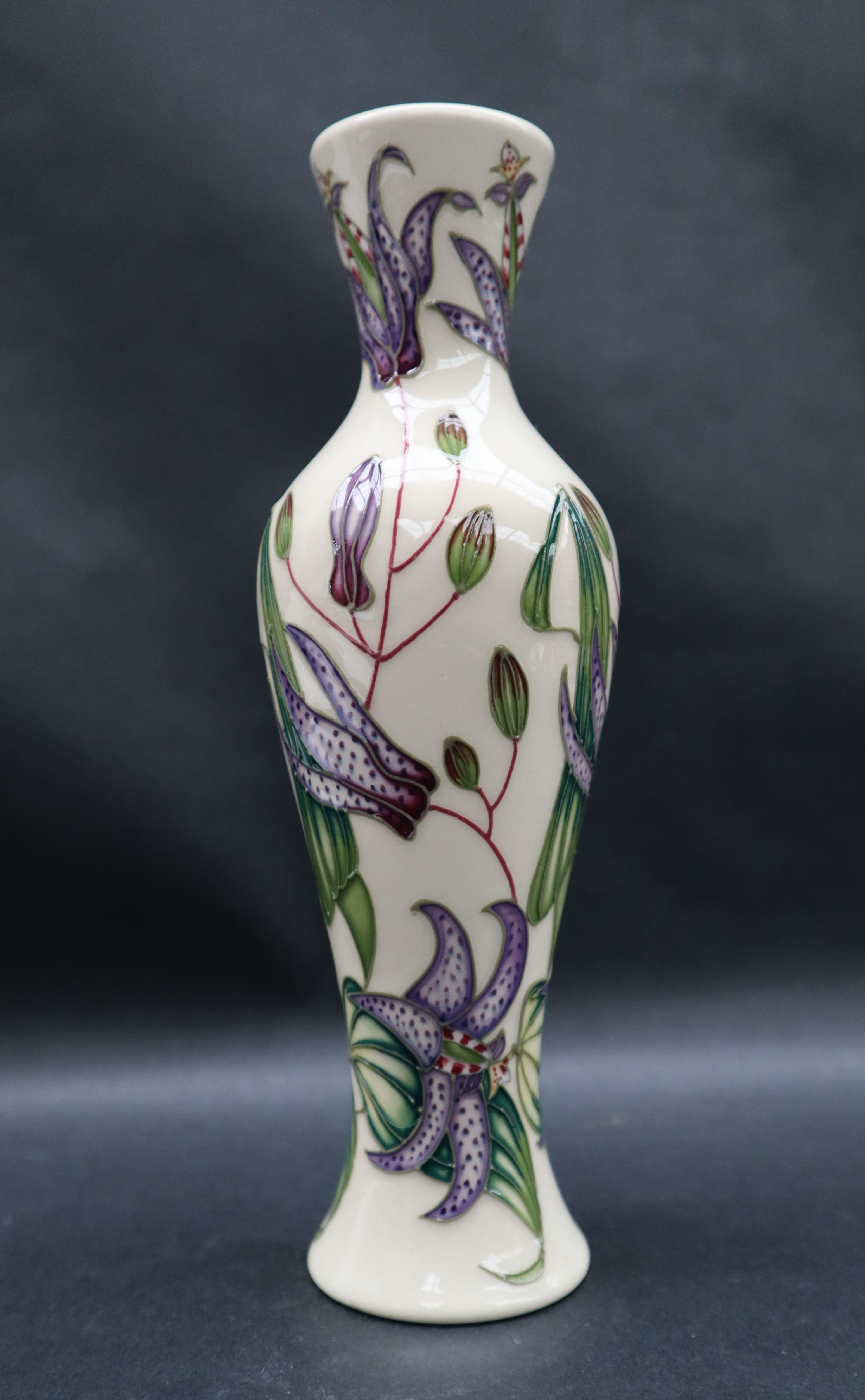 A Moorcroft pottery vase of baluster form decorated with purple tiger lilies, impressed marks, - Image 2 of 6