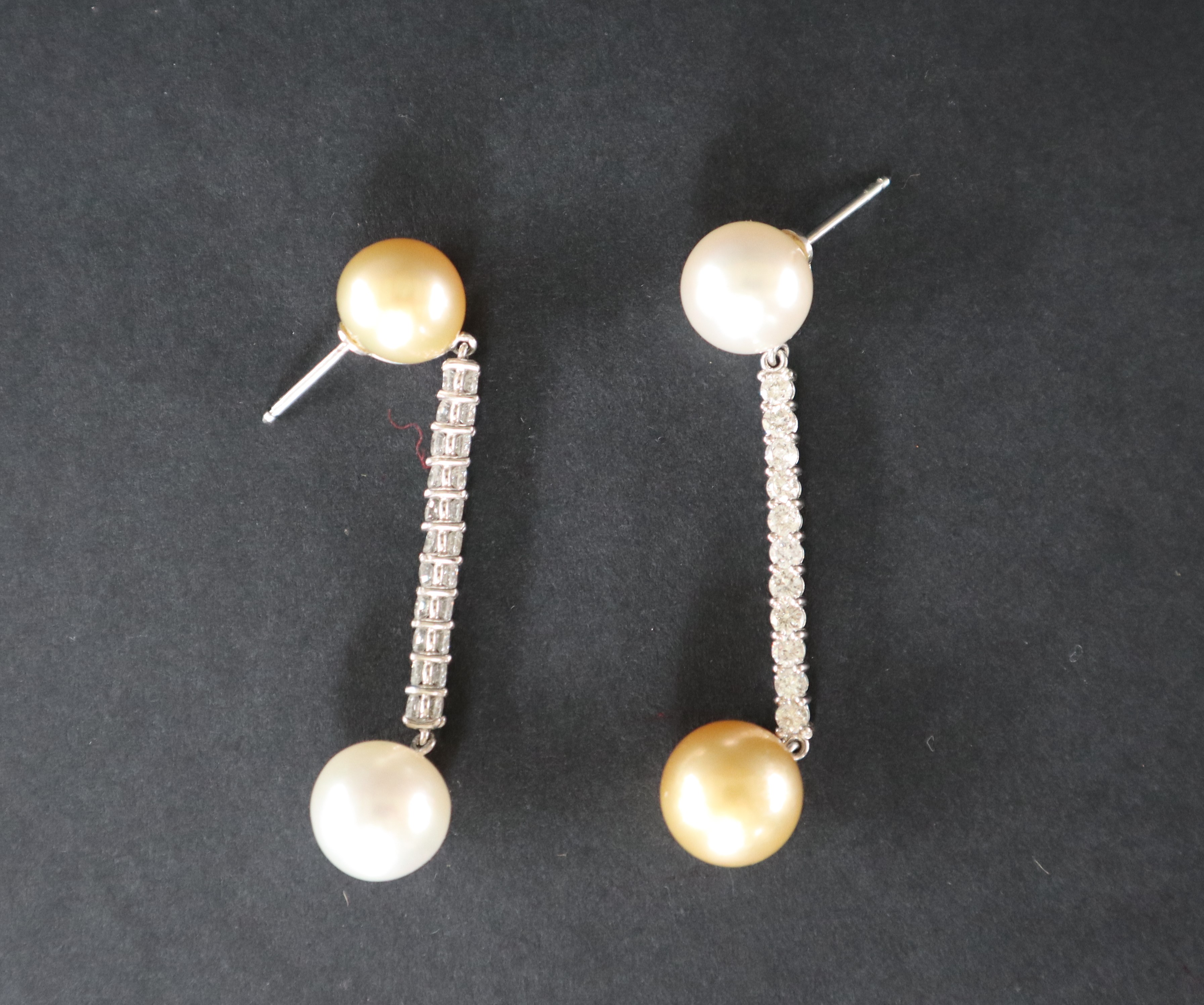 A pair of diamond and pearl drop earrings, set with a large yellow and white pearl, - Image 3 of 3