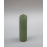 A Chinese green jade plume holder of cylindrical form, with pierced top, 5.
