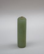 A Chinese green jade plume holder of cylindrical form, with pierced top, 5.