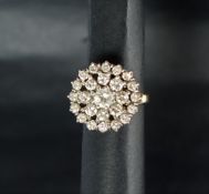 A diamond cluster ring,