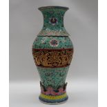 A Chinese porcelain two section vase, the flared top with turquoise ground and floral decoration,