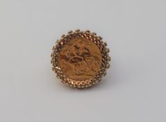 A George V gold half sovereign, dated 1914, in a 9ct yellow gold ring mount,