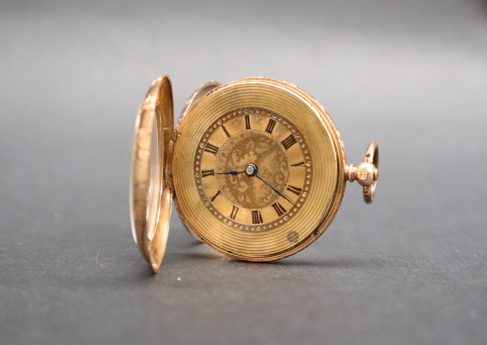 A 14k yellow gold fob watch, the case with a fan design and an initialled shield, - Image 5 of 7