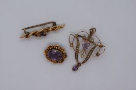 A 15ct gold bar brooch, of rope twist form set with a diamond,