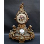 A 19th century French ormolu mantle clock, mounted with cherubs,