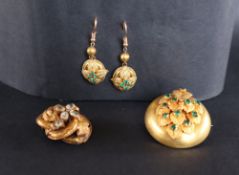 A Victorian yellow metal and paste set brooch and matching earrings together with another yellow