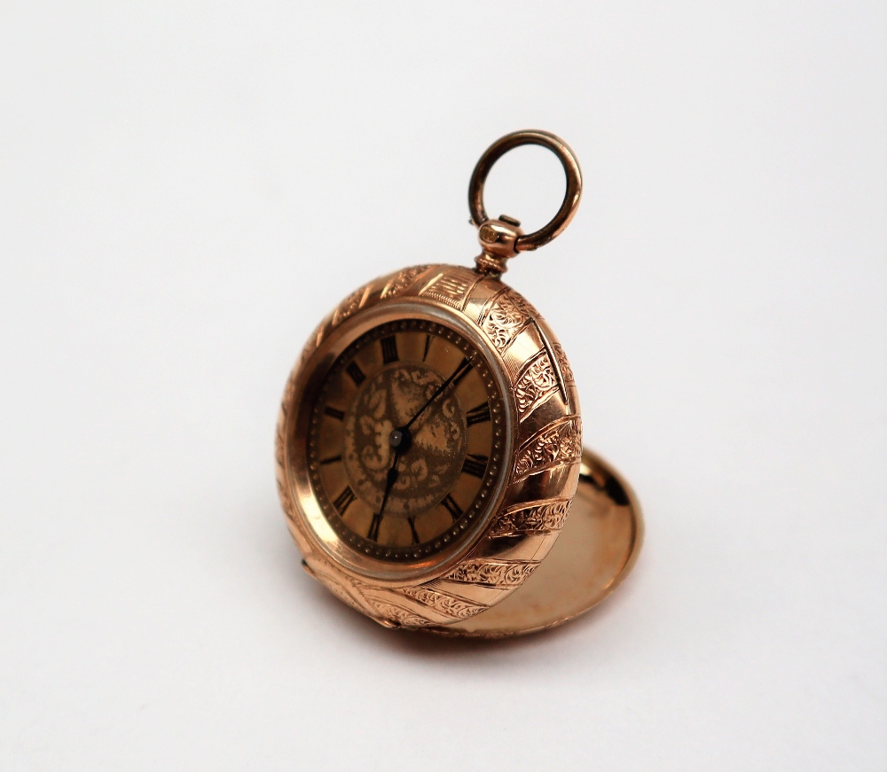 A 14k yellow gold fob watch, the case with a fan design and an initialled shield,