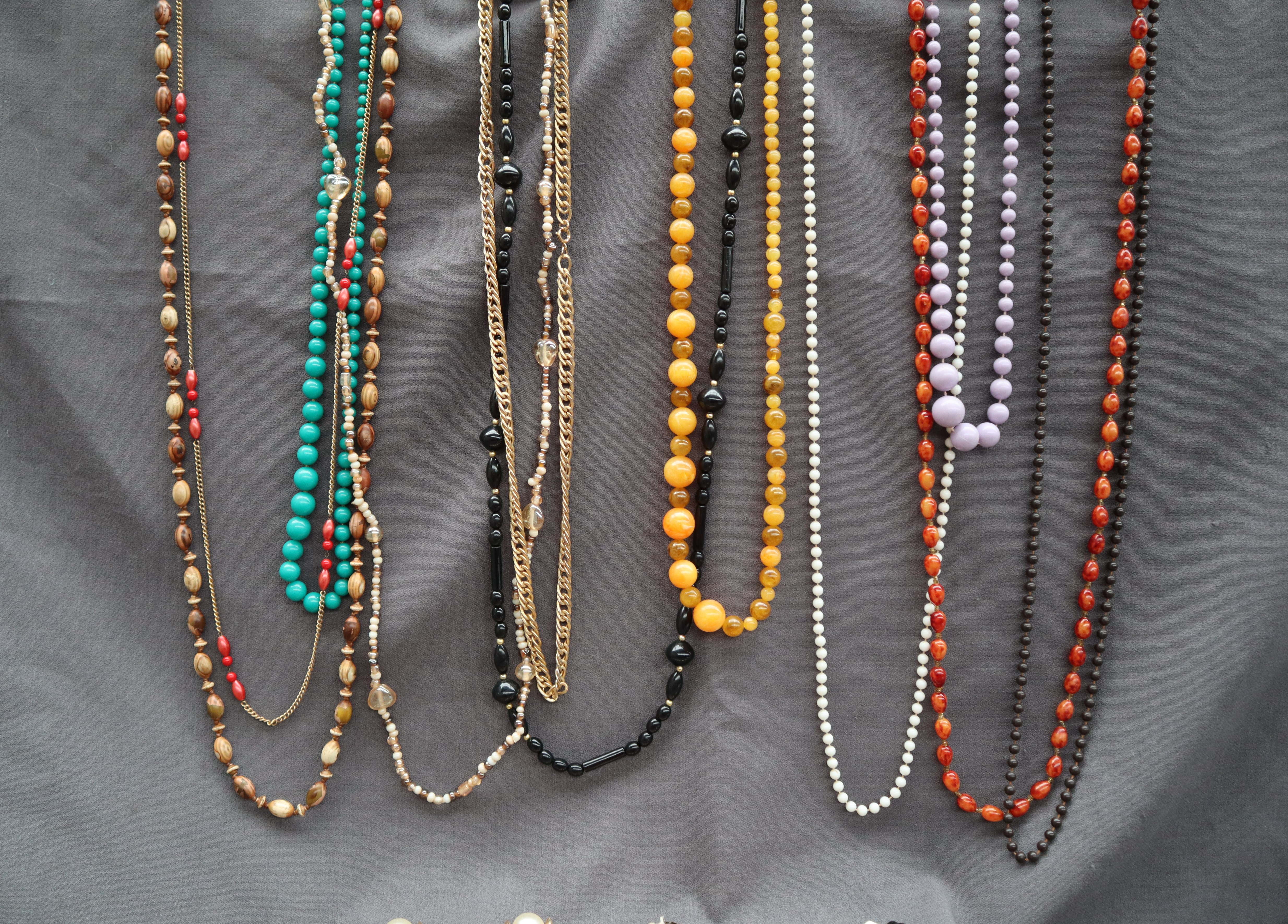 A collection of costume jewellery including beaded necklaces, brooches, - Image 3 of 3