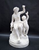 A parian figure group of a seated Ino feeding the infant Bacchus grapes on a circular base, 32.