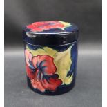 A Moorcroft pottery ginger jar and cover of cylindrical form,