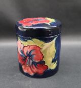 A Moorcroft pottery ginger jar and cover of cylindrical form,