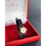 A lady's 9ct gold Omega wristwatch,