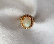 An opal and diamond cluster ring,