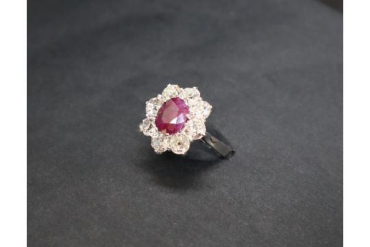 A ruby and diamond cluster ring, - Image 1 of 6