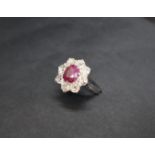 A ruby and diamond cluster ring,