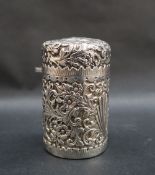 A Victorian silver scent bottle holder, of cylindrical form with a domed lid,