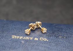 A pair of diamond stud earrings, each approximatel 0.