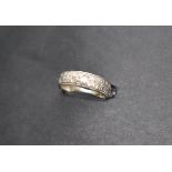 A platinum wedding band, approximately 7 grams,