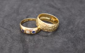 An 18ct yellow gold sapphire and diamond gypsy ring,