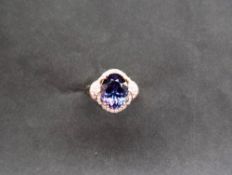 Gemporia - A 7.9cts oval tanzanite and diamond 18k gold Lorique ring, size N to O, metal 5.