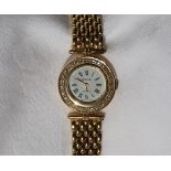 A lady's 18ct yellow gold wristwatch, the white dial with Roman numerals inscribed Geneve, Quartz,