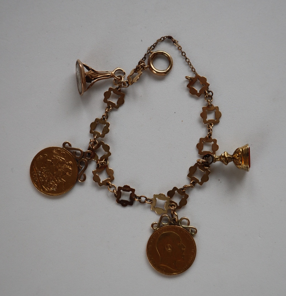 A 9ct yellow gold bracelet, set with two Edward VII gold sovereigns,