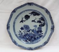 A Chinese porcelain charger of octagonal form,