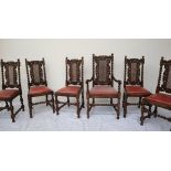 A set of six 17th century style oak dining chairs, with a carved cresting rail,