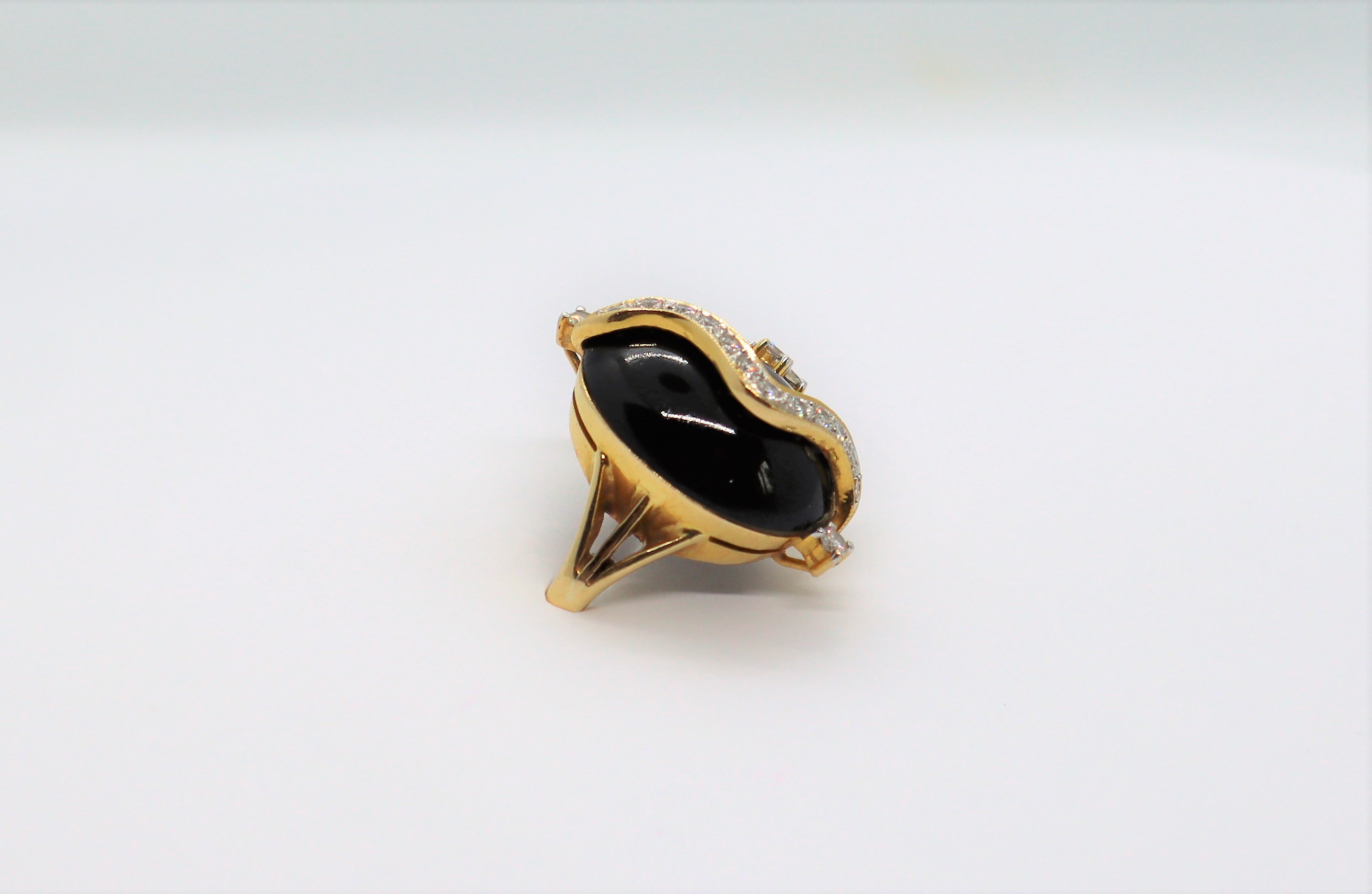 A diamond and cabochon onyx dress ring, - Image 3 of 7