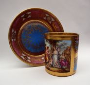 A Vienna style porcelain cabinet cup and saucer, Painted with cupid and other figures,