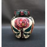 A Moorcroft pottery ginger jar and cover, decorated in the Melody pattern,