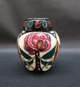 A Moorcroft pottery ginger jar and cover, decorated in the Melody pattern,