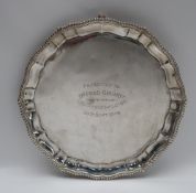 A George VI silver salver, with a gadrooned edge,