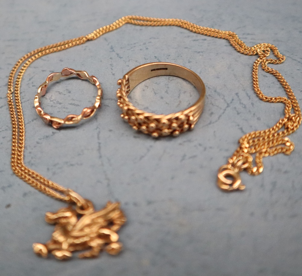 A 9ct yellow gold dragon pendant on a 9ct gold chain, together with a 9ct gold ring, - Image 3 of 3