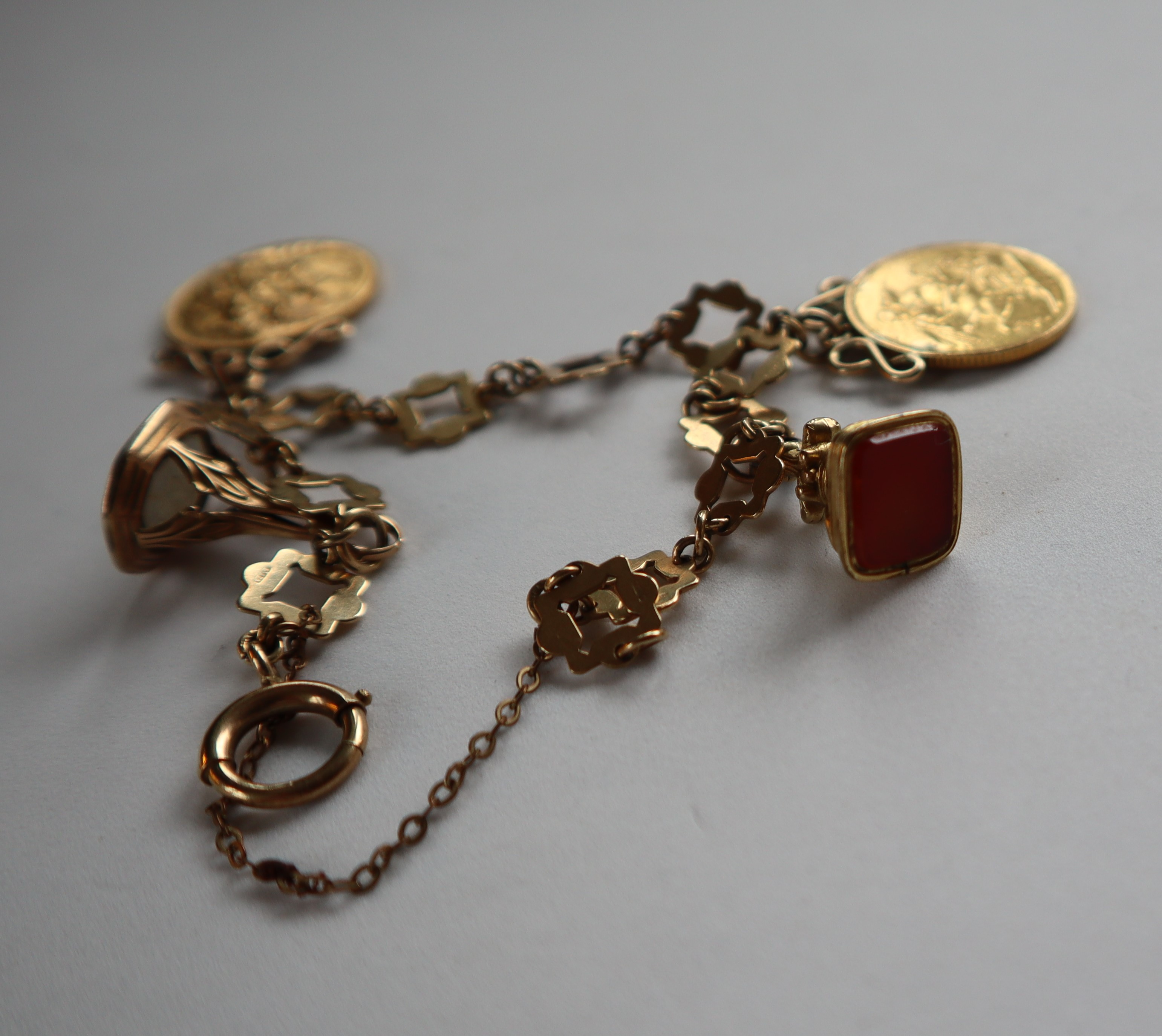 A 9ct yellow gold bracelet, set with two Edward VII gold sovereigns, - Image 3 of 3