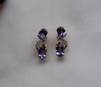 Gemporia - A pair of Tanzanite and Diamond 18k gold Tomas Rae earrings,