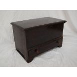 An 18th century oak coffer bach, the rectangular hinged top above a base drawer on bracket feet,