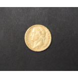 An Emperor Napoleon gold 20 Franc coin dated 1813