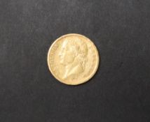 An Emperor Napoleon gold 20 Franc coin dated 1813