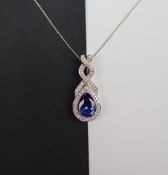 Gemporia - A 2.110cts pear shaped Tanzanite and diamond platinum set pendant and chain, metal 7.