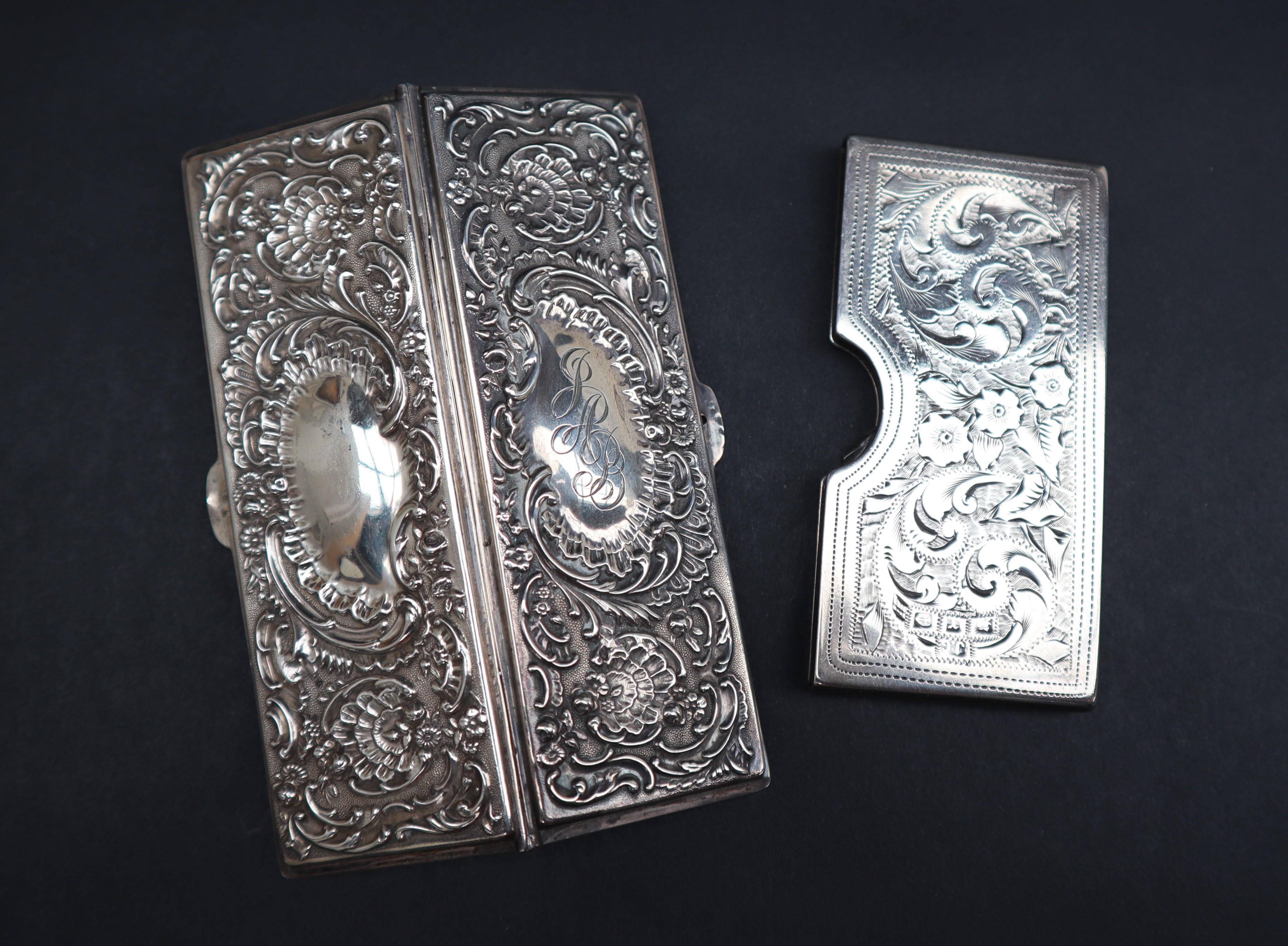 A late Victorian silver card case of rectangular form, decorated with flowerheads and leaves, - Image 2 of 3
