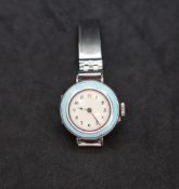 A Continental silver and enamel decorated lady's wristwatch,