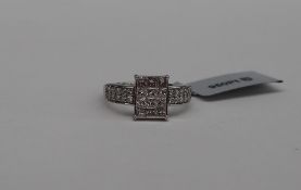 Gemporia - A diamond platinum set Tomas Rae ring, set with thirty two square and round cut diamonds,